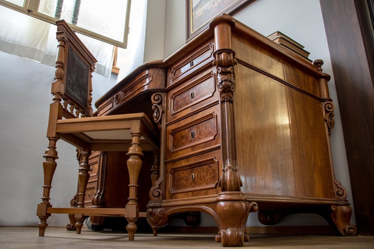 Historical office with old wooden table and seat